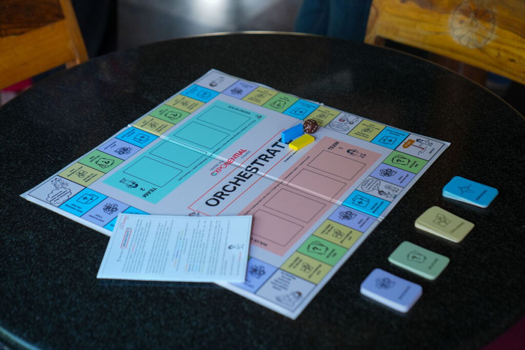 Explore Orchestrate: A collaborative and playful experience for leaders and their teams navigating change at scale. 